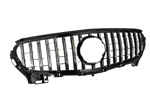 Car grille with vertical chrome slats and a central circular emblem cutout, set against a white background.