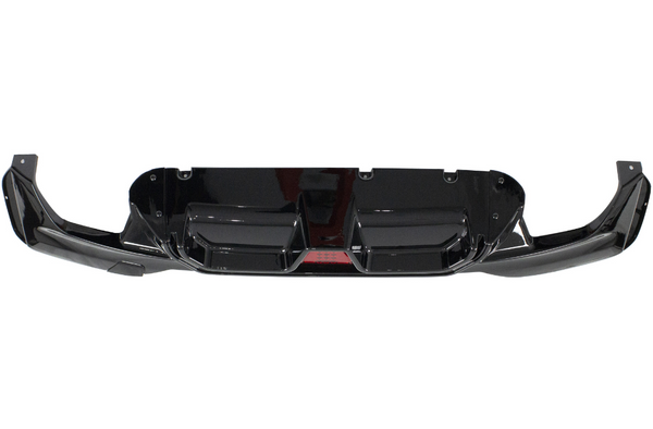 A shiny black car bumper with aerodynamic features is displayed against a white background, highlighting its sleek design and mounting points.