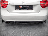 A white Mercedes A250 car is parked in a showroom on a checkered floor. The rear features a Maxton Design diffuser. The license plate reads 