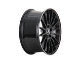 A black alloy wheel with a multi-spoke design, displaying a Mercedes-Benz logo at the center, positioned against a plain white background.