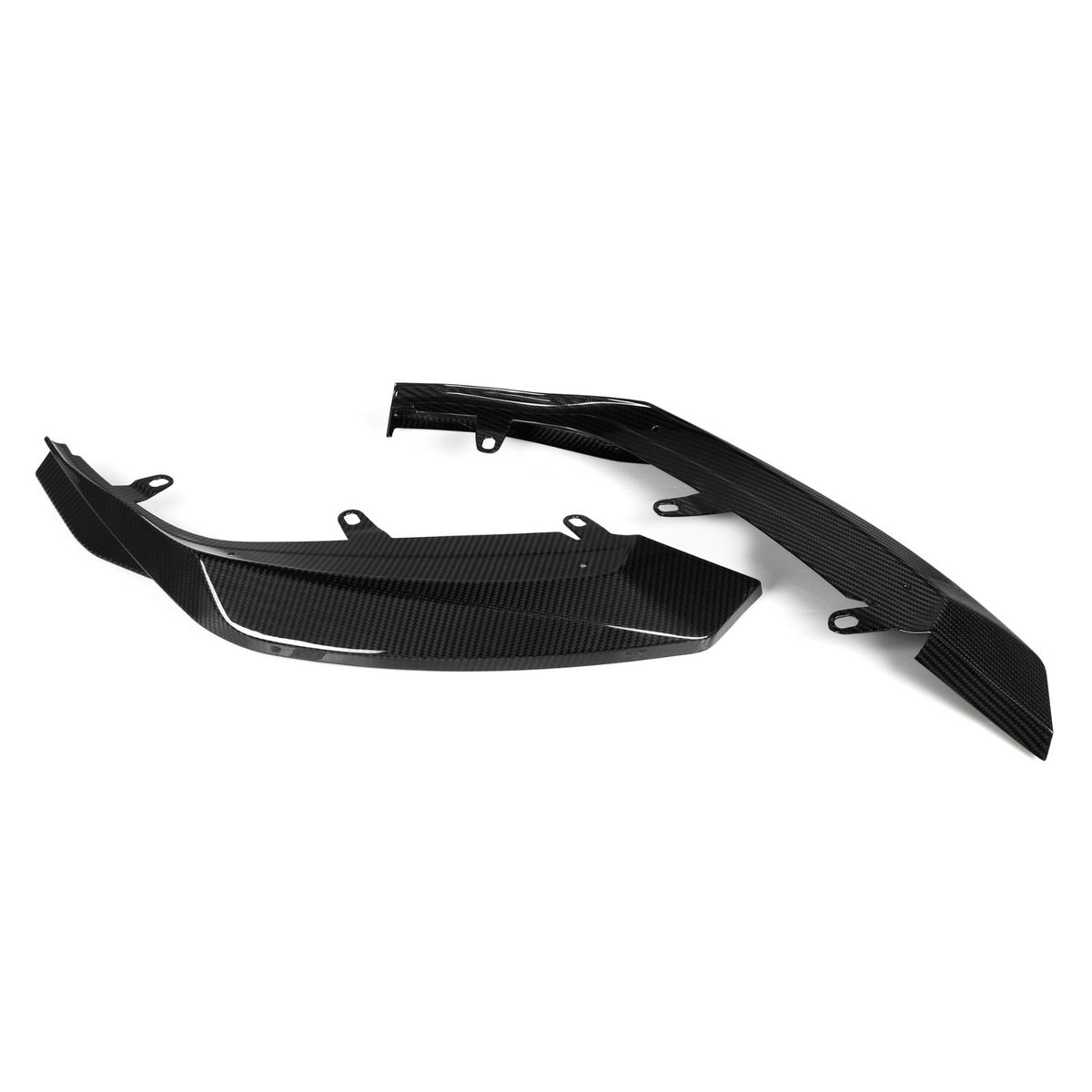 Two black carbon fiber car parts, resting on a white background. Each piece features mounting brackets, showcasing an intricate weave pattern typical of carbon fiber components.