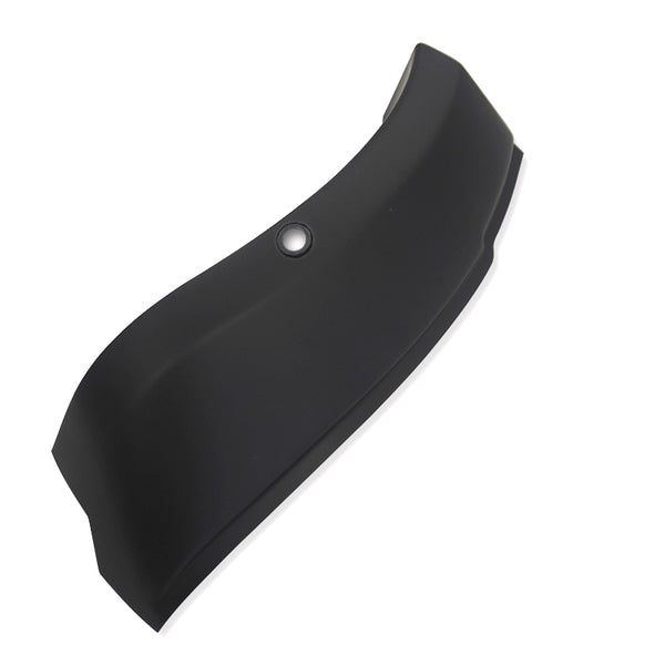 Curved black object with a smooth surface and a circular indentation, possibly a mounting hole, set against a plain white background.
