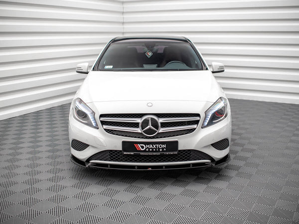A white Mercedes-Benz car is parked in a room with patterned floors and striped walls. A front license plate reads "MAXTON design."