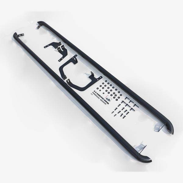 Metal car roof rack partially assembled on a white surface, featuring black bars with mounting brackets and numerous small parts like screws and washers neatly arranged around it.