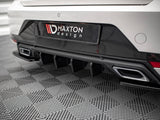 Car's rear bumper features dual exhaust outlets and diffuser; black 