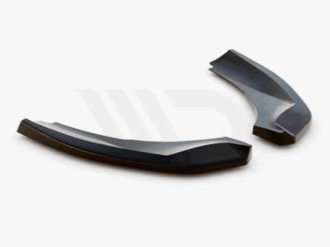 Two sleek, black aerodynamic components rest on a light background. Small text below reads, "WORLDWIDE LEADER IN AERODYNAMIC COMPONENTS."