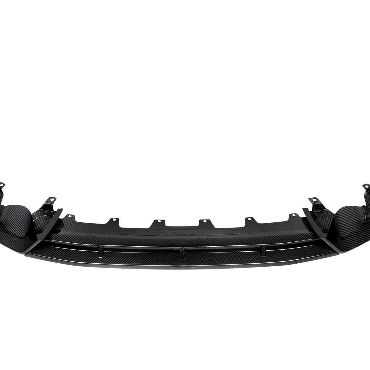 Curved black carbon fiber car bumper with mounting brackets, positioned horizontally against a plain white background, displaying a sleek design and intricate texture.