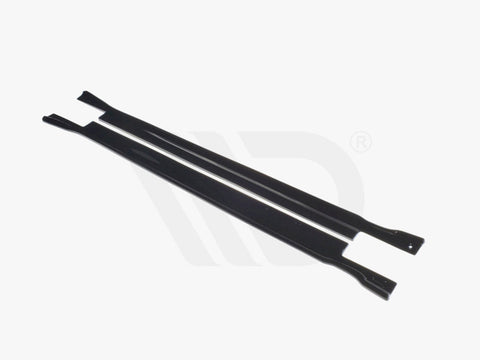 Two sleek, black aerodynamic components lie parallel to each other against a white background. Text at the bottom reads: "WORLDWIDE LEADER IN AERODYNAMIC COMPONENTS."