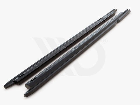 Two black, elongated plastic strips lie parallel on a white surface, likely used for aerodynamic purposes. Text below reads, "WORLDWIDE LEADER IN AERODYNAMIC COMPONENTS."