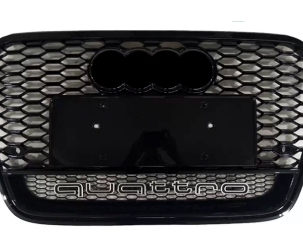 A black honeycomb car grille with four rings and the word "quattro" below, set against a white background.