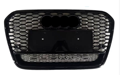 A black honeycomb car grille with four rings and the word "quattro" below, set against a white background.
