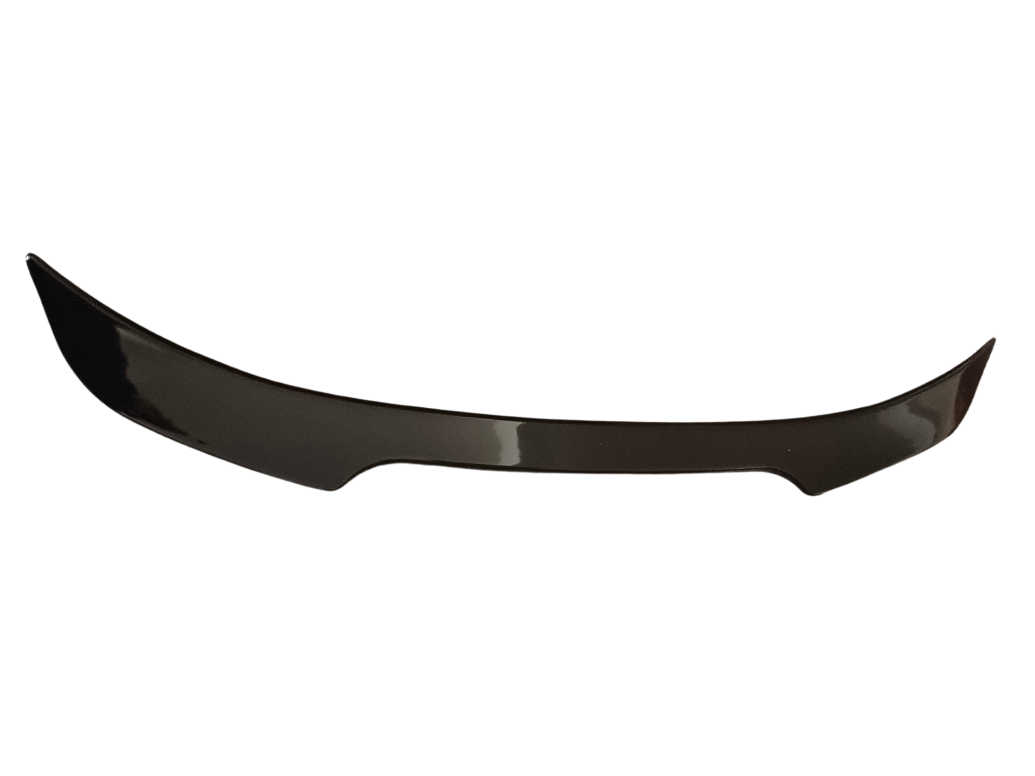 A smooth, black, curved car spoiler lies on a plain, white background, exhibiting a sleek design with upward turned edges, suggesting aerodynamic functionality in automotive applications.