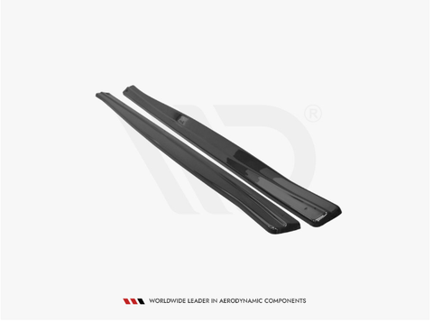 Two sleek, black aerodynamic components lie side by side on a plain background. Text below reads: "WORLDWIDE LEADER IN AERODYNAMIC COMPONENTS."