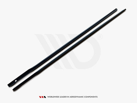 Two long, slender black rods lie parallel on a light background. The lower rod has a hole near one end. Text reads: "WORLDWIDE LEADER IN AERODYNAMIC COMPONENTS."