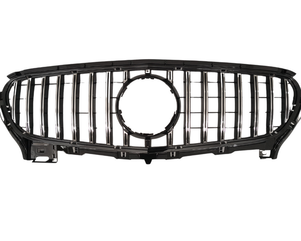 Chrome vehicle grille with vertical slats and a central circular emblem space, resting on a plain white background, displaying a sleek and modern design.