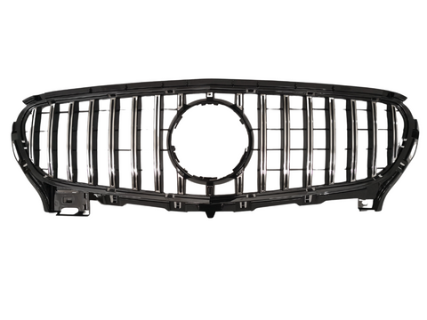Chrome vehicle grille with vertical slats and a central circular emblem space, resting on a plain white background, displaying a sleek and modern design.