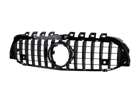 A black car grille with vertical slats, featuring a prominent circular emblem space in the center, isolated against a white background.