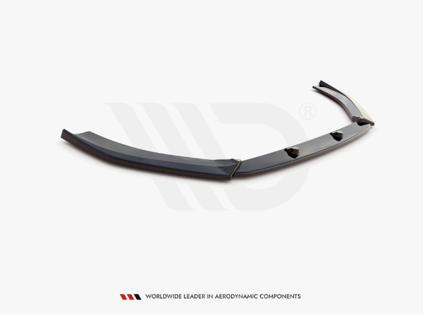 A sleek black aerodynamic car component lies on a white background with subtle logo watermarking, featuring mounting points. Text at the bottom reads: "WORLDWIDE LEADER IN AERODYNAMIC COMPONENTS."