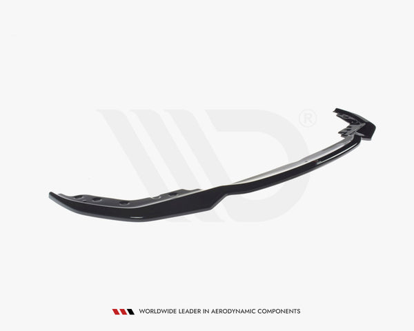 A sleek, black aerodynamic car spoiler lies on a plain white background. Text reads: "WORLDWIDE LEADER IN AERODYNAMIC COMPONENTS."