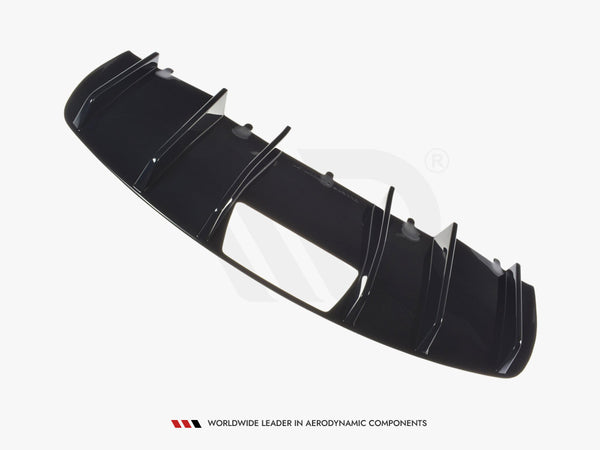 Black aerodynamic car diffuser with vertical fins, displayed against a plain white background. Text reads: "WORLDWIDE LEADER IN AERODYNAMIC COMPONENTS."
