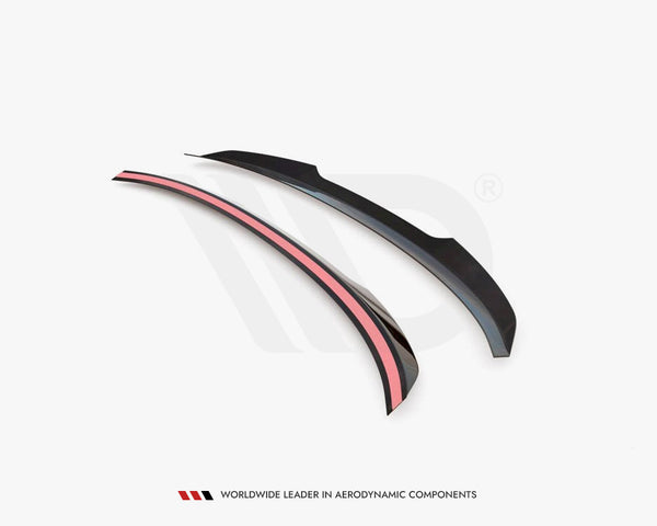 Two aerodynamic car spoiler extensions, one with a pink strip, are displayed on a white background. Text reads: "WORLDWIDE LEADER IN AERODYNAMIC COMPONENTS."