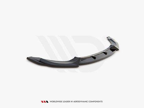 Curved, black car spoiler rests on a plain white background. Text reads: "WORLDWIDE LEADER IN AERODYNAMIC COMPONENTS" beneath the image.
