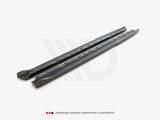 Two long, sleek car components are placed parallel on a plain surface. The text reads, 