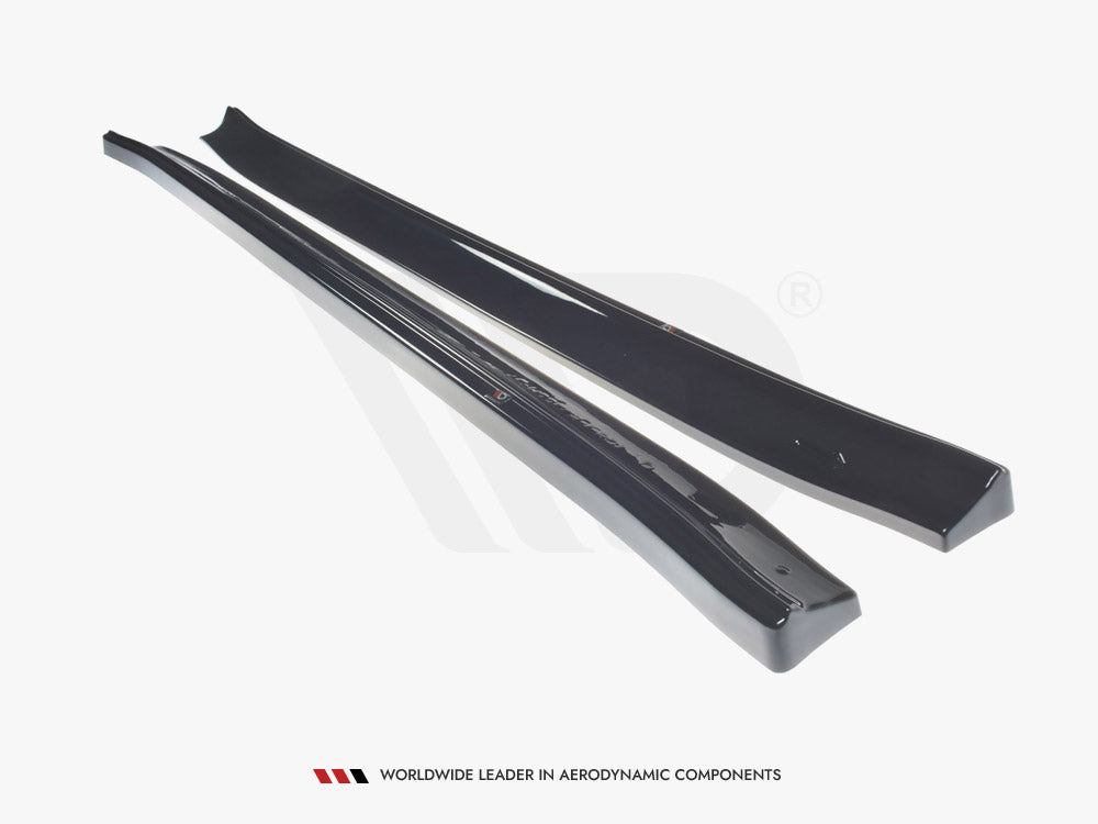 Two glossy black aerodynamic car side skirts are placed parallel on a white background. Text at the bottom reads: "WORLDWIDE LEADER IN AERODYNAMIC COMPONENTS."