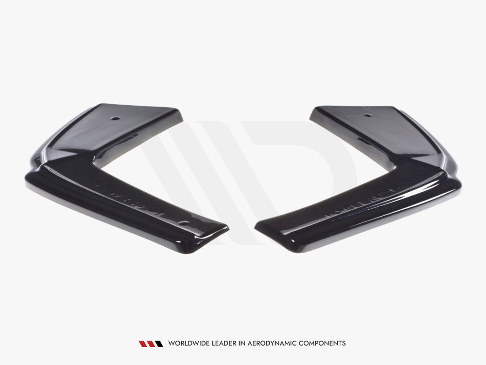 Two black aerodynamic components are positioned to face each other on a white background. Text below reads: "WORLDWIDE LEADER IN AERODYNAMIC COMPONENTS".