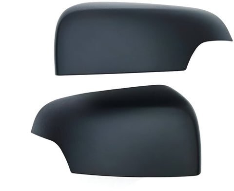 Two matte black car side mirror covers are displayed against a plain white background, showing their sleek, rounded shape and smooth surface.