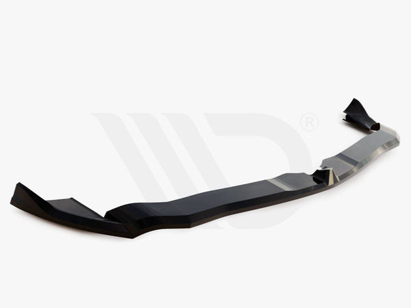 A black aerodynamic car component lies on a white background. Text: "WORLDWIDE LEADER IN AERODYNAMIC COMPONENTS" is at the bottom.