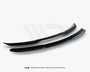 Two black aerodynamic car components rest on a white background, showcasing their sleek, curved design. Text below reads: "WORLDWIDE LEADER IN AERODYNAMIC COMPONENTS."