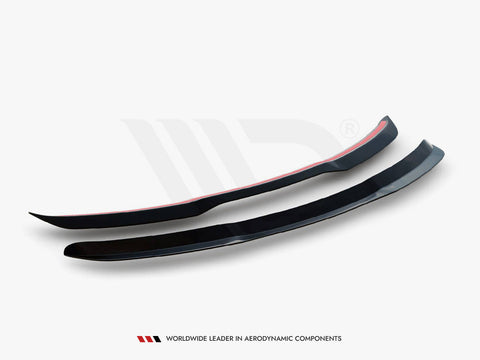 Two black aerodynamic car components rest on a white background, showcasing their sleek, curved design. Text below reads: "WORLDWIDE LEADER IN AERODYNAMIC COMPONENTS."