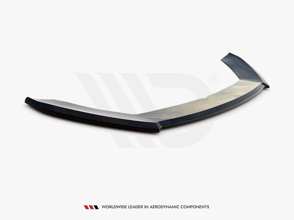 A sleek, black aerodynamic car spoiler rests on a plain white surface. Text below reads: "WORLDWIDE LEADER IN AERODYNAMIC COMPONENTS."