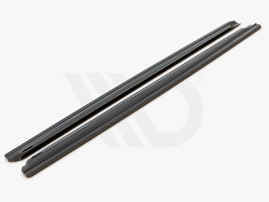 Two long, black side skirts lie parallel on a white background. Below, text reads: "WORLDWIDE LEADER IN AERODYNAMIC COMPONENTS."