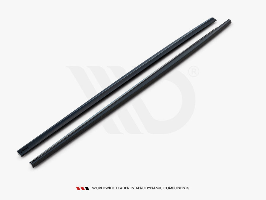 Two sleek, black aerodynamic components lie parallel on a white surface. Text below reads: "WORLDWIDE LEADER IN AERODYNAMIC COMPONENTS."