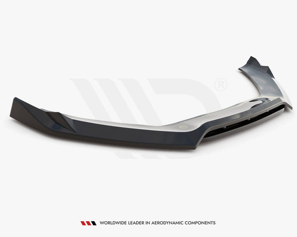 A dark, aerodynamic car spoiler lies on a white surface. Below it, text reads: "WORLDWIDE LEADER IN AERODYNAMIC COMPONENTS."