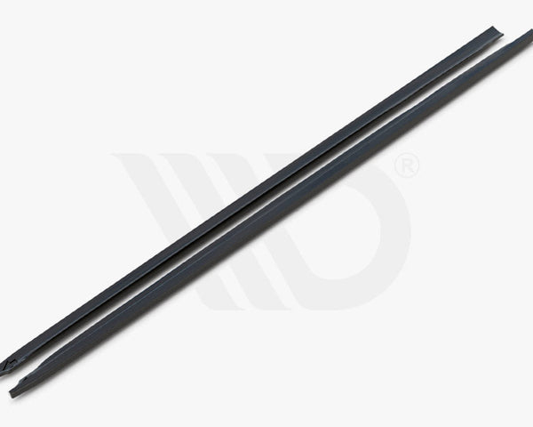 Two long, black aerodynamic components resting parallel against a white background. Text below reads, "WORLDWIDE LEADER IN AERODYNAMIC COMPONENTS."