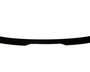 A black car spoiler lies flat against a white background, emphasizing its sleek, curved design and aerodynamic form.