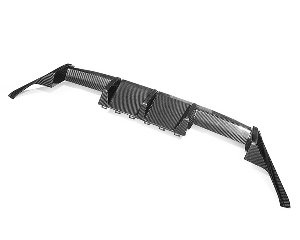 A carbon fiber car diffuser, featuring aerodynamic fins, is displayed on a plain white background. The structure is sleek and angular, designed to enhance vehicle performance.