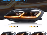 A car headlight unit features an illuminated turn signal with sequential indicator in orange. The text reads 