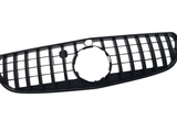 A black car grille with horizontal and vertical slats features a large circular opening in the center, designed for vehicle front ends, isolated on a white background.