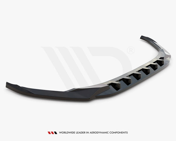 Curved black car spoiler resting on a plain white background. It features angular design elements for aerodynamic enhancement. Text reads: "Worldwide Leader in Aerodynamic Components" at the bottom.