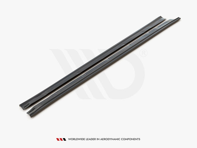 Two sleek, black side skirts lie parallel on a white background. Text below reads: "WORLDWIDE LEADER IN AERODYNAMIC COMPONENTS."