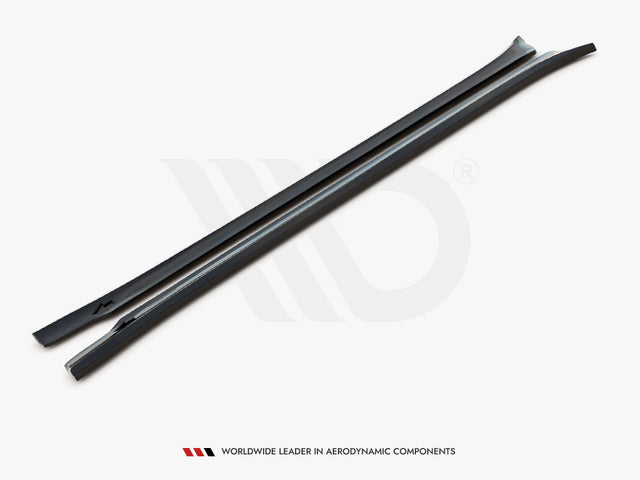 Two elongated, black aerodynamic bars lay side by side on a white surface. Text reads: "WORLDWIDE LEADER IN AERODYNAMIC COMPONENTS" at the bottom.