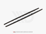 Two black aerodynamic wiper blades rest side by side on a white surface. Text below reads: 