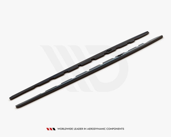 Two black aerodynamic wiper blades rest side by side on a white surface. Text below reads: "WORLDWIDE LEADER IN AERODYNAMIC COMPONENTS."