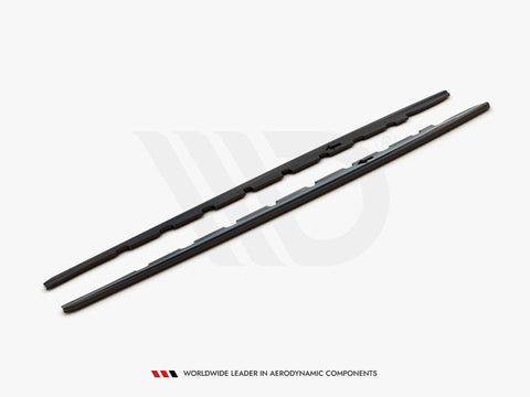 Two black aerodynamic wiper blades rest side by side on a white surface. Text below reads: "WORLDWIDE LEADER IN AERODYNAMIC COMPONENTS."