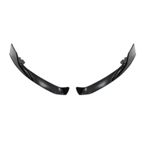 Two sleek, black bumper trim pieces face each other symmetrically on a white background, suggesting car accessory components.