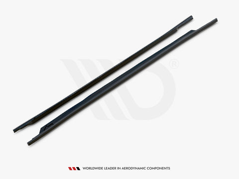 Two long, black aerodynamic components are placed diagonally on a light background. Below them, text reads: "WORLDWIDE LEADER IN AERODYNAMIC COMPONENTS."